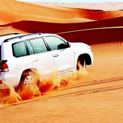 Red Dunes Safari with Sandboarding & Camel Ride from Ras Al Khayma