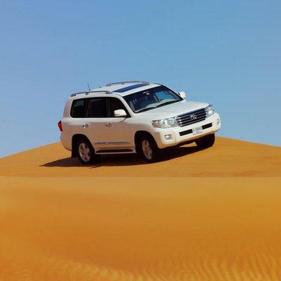 Dubai Red Dune Safari with BBQ Dinner & Live Shows from RAK