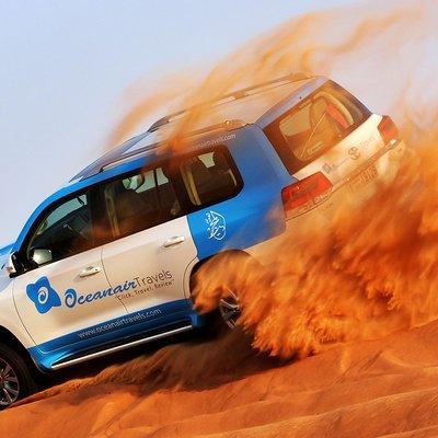 Abu Dhabi: Desert Safari with BBQ, Camel Ride & Sandboarding