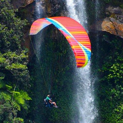 PARAGLIDING over giant waterfalls private tour (optional Guatape) from Medellin
