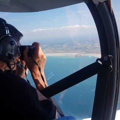 Fly above Normandy's hallowed coastline in a private plane