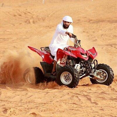 Desert Safari With BBQ Dinner, Quad Bike & Camel Ride from Dubai