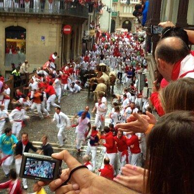 Authentic San Fermín experience with balcony and buffet breakfast. 