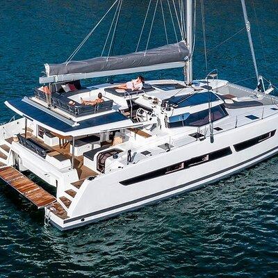 Semi-Private Brand-New Catamaran Cruise in Mykonos with Meal, Drinks & Transport