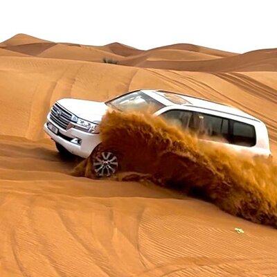 Evening Dubai Desert Safari With BBQ Dinner & Camel Ride